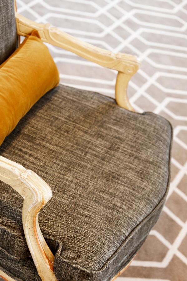 Althoff Hotel Fuerstenhof Celle Exterior photo A chair upholstered in tweed
